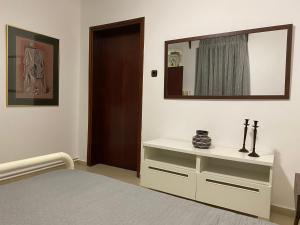 A bed or beds in a room at Sarakinas Farm House