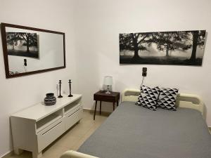 A bed or beds in a room at Sarakinas Farm House
