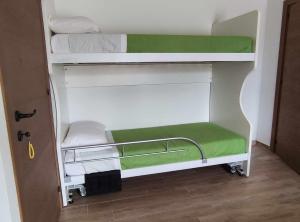 A bed or beds in a room at Casa Montefiore 13 LT nella tranquilla campagna Marchigiana