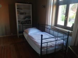 Ένα ή περισσότερα κρεβάτια σε δωμάτιο στο Ferienhaus Caselow 23A