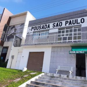 a building with a sign that reads pussada sao paulo at Pousada São Paulo Piranhas AL in Piranhas