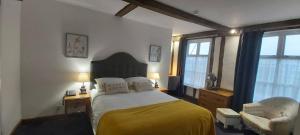 Ένα ή περισσότερα κρεβάτια σε δωμάτιο στο The Ram at Tivetshall