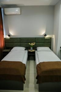 Postel nebo postele na pokoji v ubytování Апарт-отель Nine Rooms