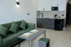Kuchyň nebo kuchyňský kout v ubytování Апарт-отель Nine Rooms
