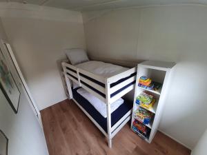 Postel nebo postele na pokoji v ubytování Tiny House Mehring