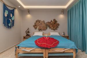 Posteľ alebo postele v izbe v ubytovaní Iniohos Zante Hotel & Suites