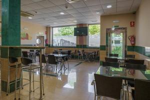 Restaurant o un lloc per menjar a Hostal Acueducto Los Milagros