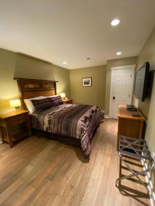 En eller flere senge i et værelse på Fitzhugh House Guest Accomodation