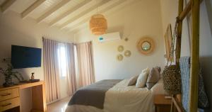 TV a/nebo společenská místnost v ubytování Amardecer - Casa Boutique