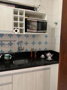 Dapur atau dapur kecil di Apartamento confortável, região do Iguatemi