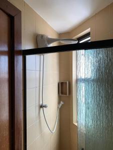 Ванна кімната в Apartamento confortável, região do Iguatemi