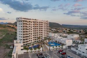 an aerial view of a large building with a parking lot at Departamento Ibiza in La Paz