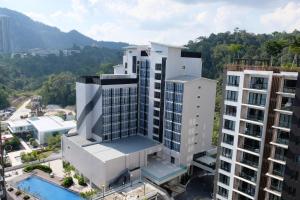 an aerial view of a building with a pool at 92 Homestay 3 Bedrooms Midhills Genting Highland in Genting Highlands