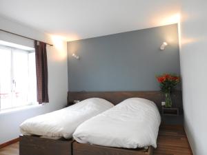 Postel nebo postele na pokoji v ubytování Au Bon Gîte
