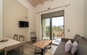 A television and/or entertainment centre at CARLOS MANSION LUXURY SUITES