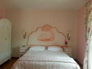 Postel nebo postele na pokoji v ubytování B&B Corte Frisonai