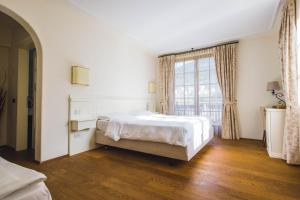Postel nebo postele na pokoji v ubytování Hotel Relais Vecchio Maso