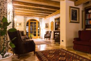 Posezení v ubytování Hotel Relais Vecchio Maso