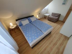 Voodi või voodid majutusasutuse Bertalan Apartman toas