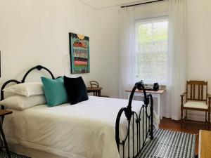 Postel nebo postele na pokoji v ubytování de Wingerd B & B
