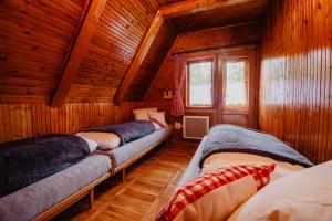 Posteľ alebo postele v izbe v ubytovaní Chalupa Lieskovec