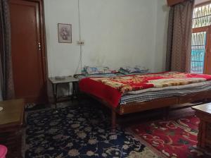 Postel nebo postele na pokoji v ubytování Julay Guest House
