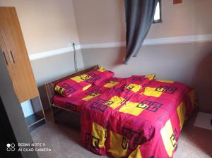 Letto o letti in una camera di The Edgewood Manor, Entire Service apartment with 24 hours power