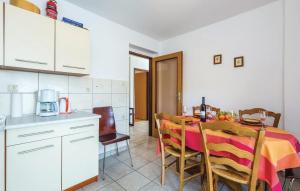 Kuchyňa alebo kuchynka v ubytovaní Apartman Nina 2