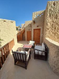 Balkón nebo terasa v ubytování Sleep In Siwa + 25 fotografií