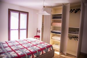 Postel nebo postele na pokoji v ubytování Residenza Zoia