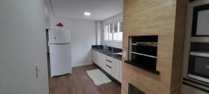A cozinha ou cozinha compacta de Apartamento Ponta do Papagaio - Térreo