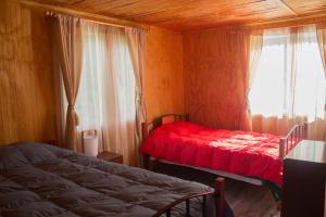 Una cama o camas en una habitación de Refugio La Rinconada