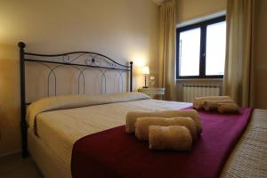 Postel nebo postele na pokoji v ubytování Le Terrazze B&B