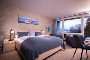 Postel nebo postele na pokoji v ubytování Park - Hotel Inseli