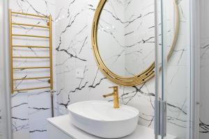 Koupelna v ubytování Adler Aparthotel