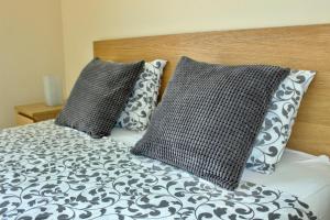 A bed or beds in a room at Beautiful Ocean View Apartment