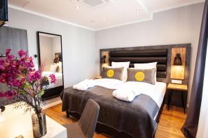 Postel nebo postele na pokoji v ubytování DORMERO Hotel Bremen