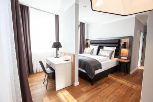 Postel nebo postele na pokoji v ubytování DORMERO Hotel Bremen