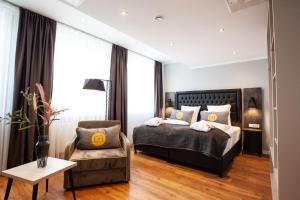 Postel nebo postele na pokoji v ubytování DORMERO Hotel Bremen