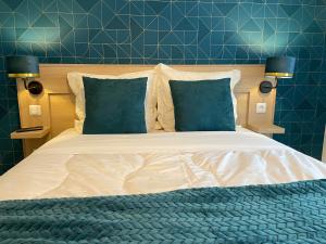 Ein Bett oder Betten in einem Zimmer der Unterkunft Ménil Bon Temps