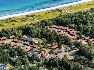 an aerial view of a resort near the beach at Holiday home Væggerløse CVIII in Marielyst