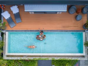 Bazén v ubytování Le Resort and Villas nebo v jeho okolí