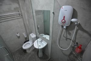 Koupelna v ubytování Vrest Hotel