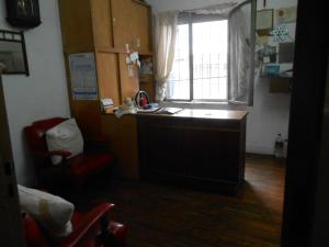 a kitchen with a sink and a window at Hotel Bahia in Buenos Aires