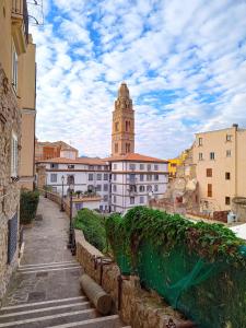a view of a city with a clock tower at Nar&igrave; Bed&Breakfast in Gaeta