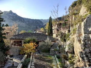 a house on the side of a mountain at Agoriani Art Suite - 4 seasons' natural living in Lílaia