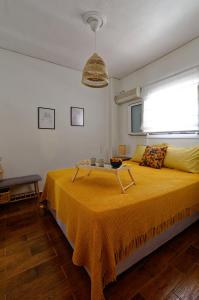A bed or beds in a room at Avlaki Getaway Villa