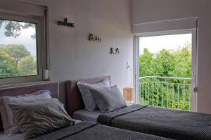 A bed or beds in a room at Avlaki Getaway Villa