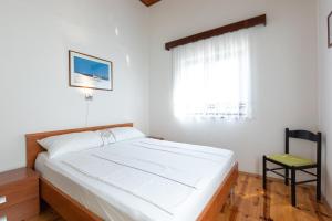 Ein Bett oder Betten in einem Zimmer der Unterkunft Marica A2 - Nr 1