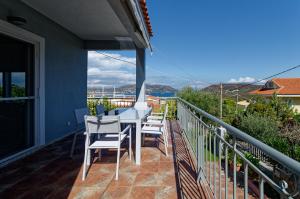 A balcony or terrace at Avlaki Getaway Villa